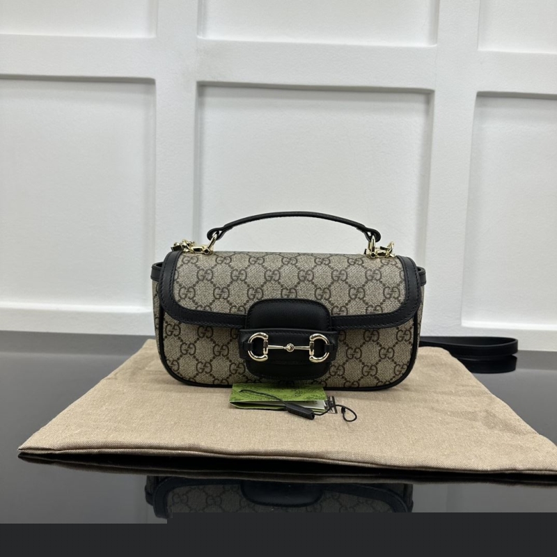 G*u*i top handle bags